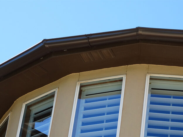 black gutters on a rounded edge