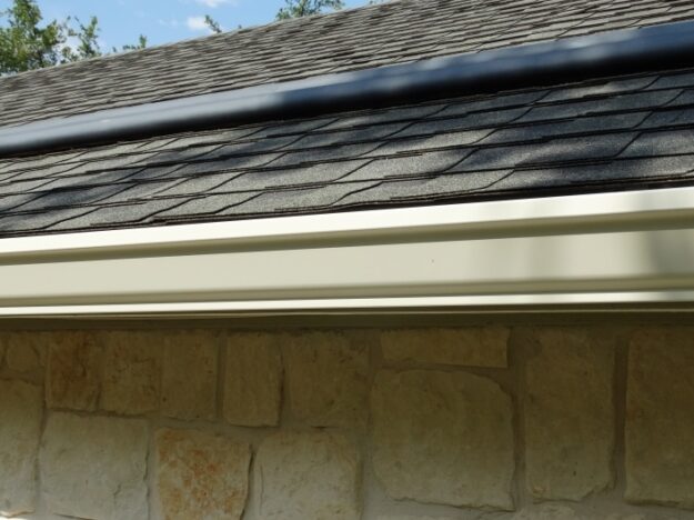 white stone gutters on residential home