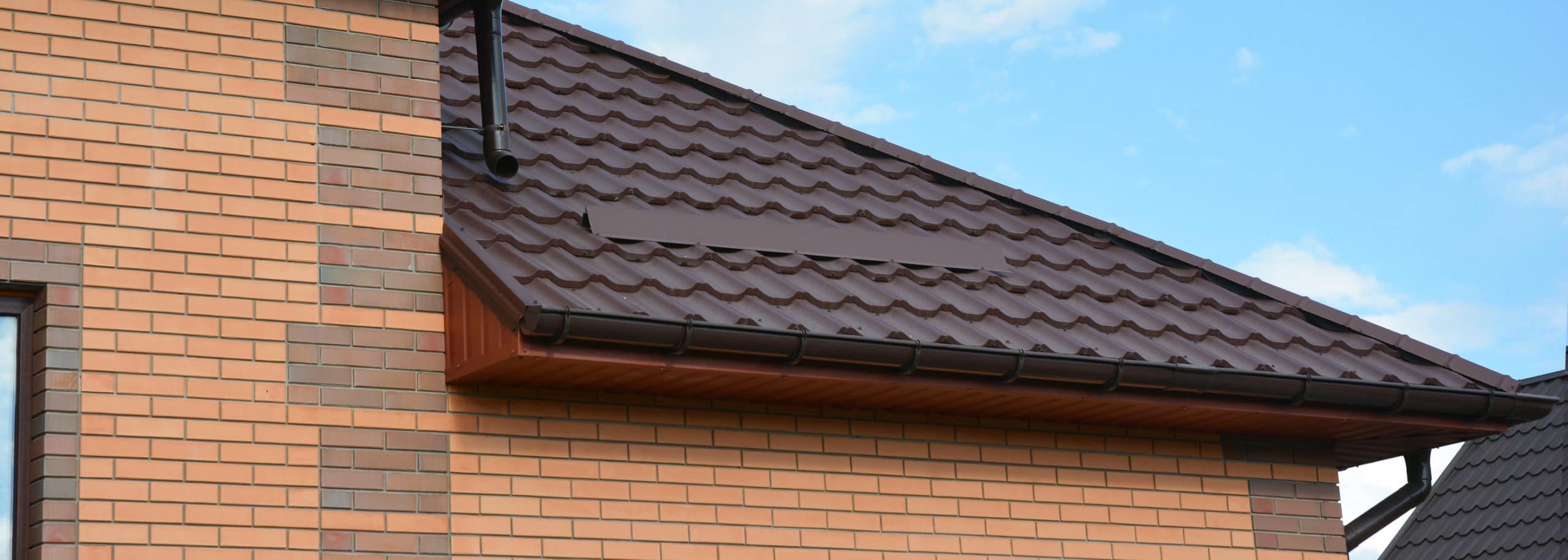 metal roof with rain gutters