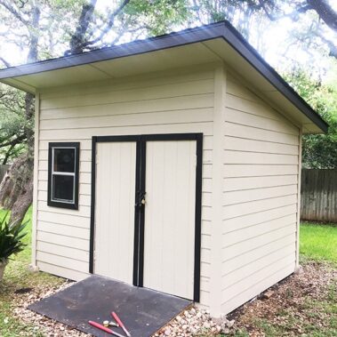 painted shed with black accents