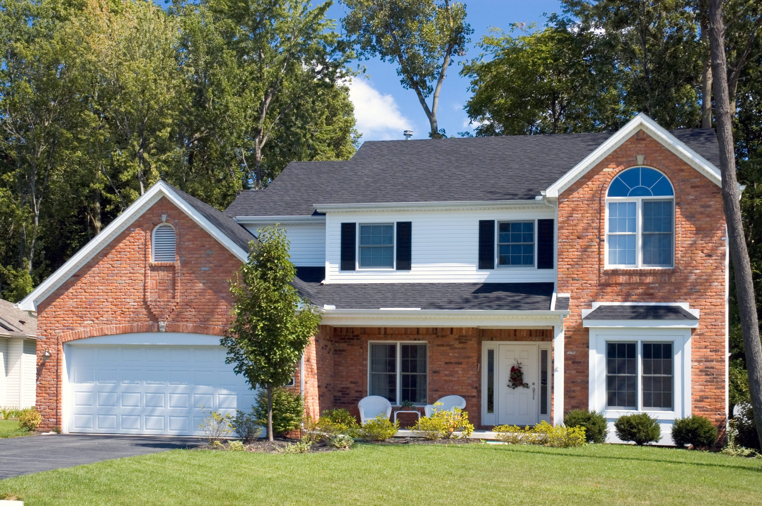 Brick home with gutters Brick home with gutters
